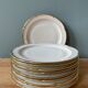 Series of 10 antique flat plates in Limoges porcelain