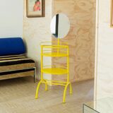 Yellow metal side table with swiveling oval mirror and two tray shelves, vintage 1960s Italy