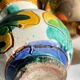 Vintage handcrafted ceramic and brass vases