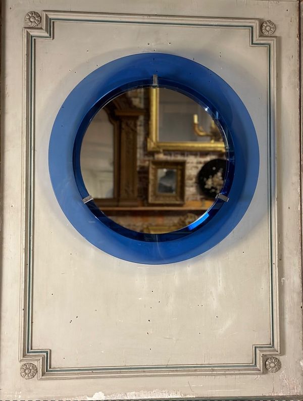 Miroir encadré d’un cercle de verre bleu, italie vers 1950