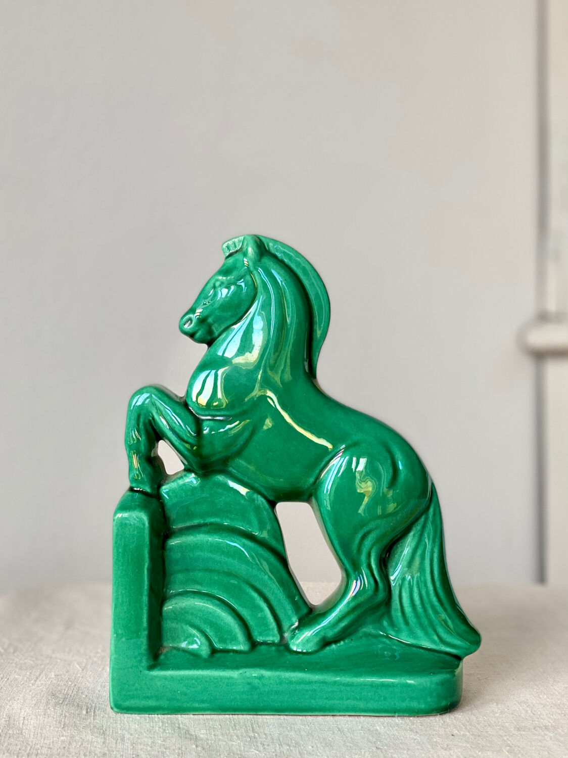 Horse bookend in green ceramic