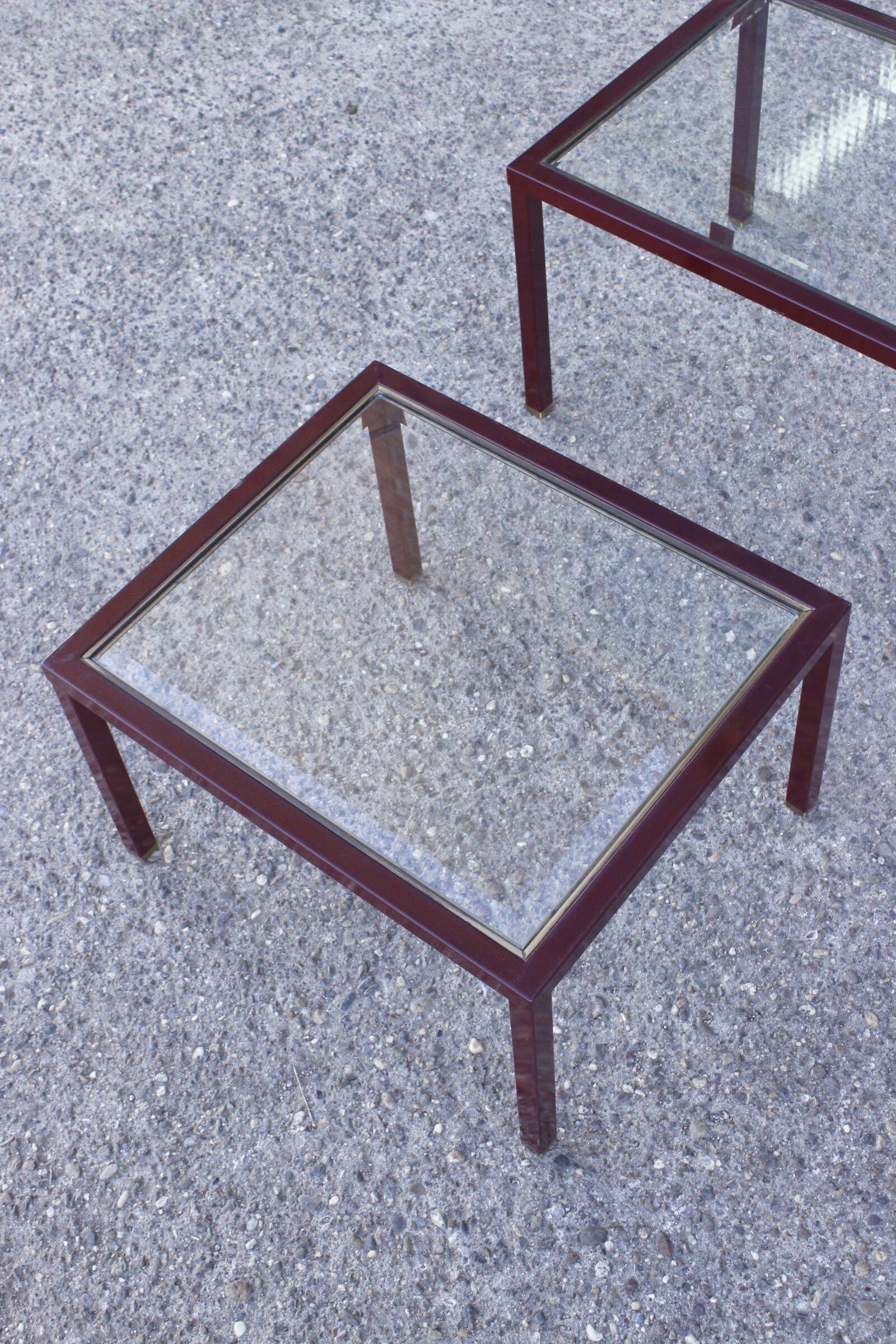 Nesting tables in burgundy lacquered metal and brass, France 1950s