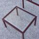 Nesting tables in burgundy lacquered metal and brass, France 1950s