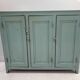 Parisian buffet with three doors in patinated beech, 20th century.