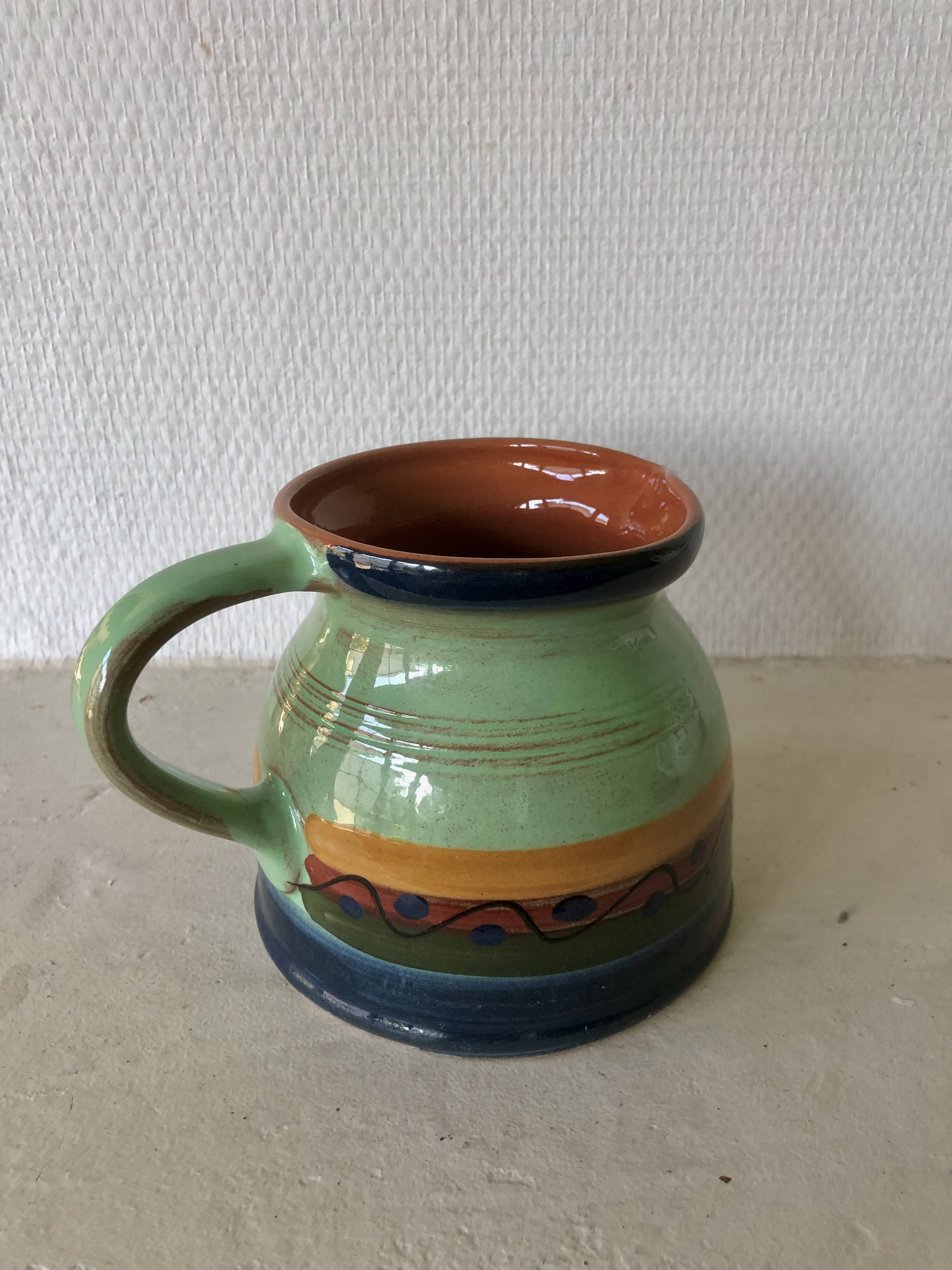 Artisanal terracotta pitcher/pottery
