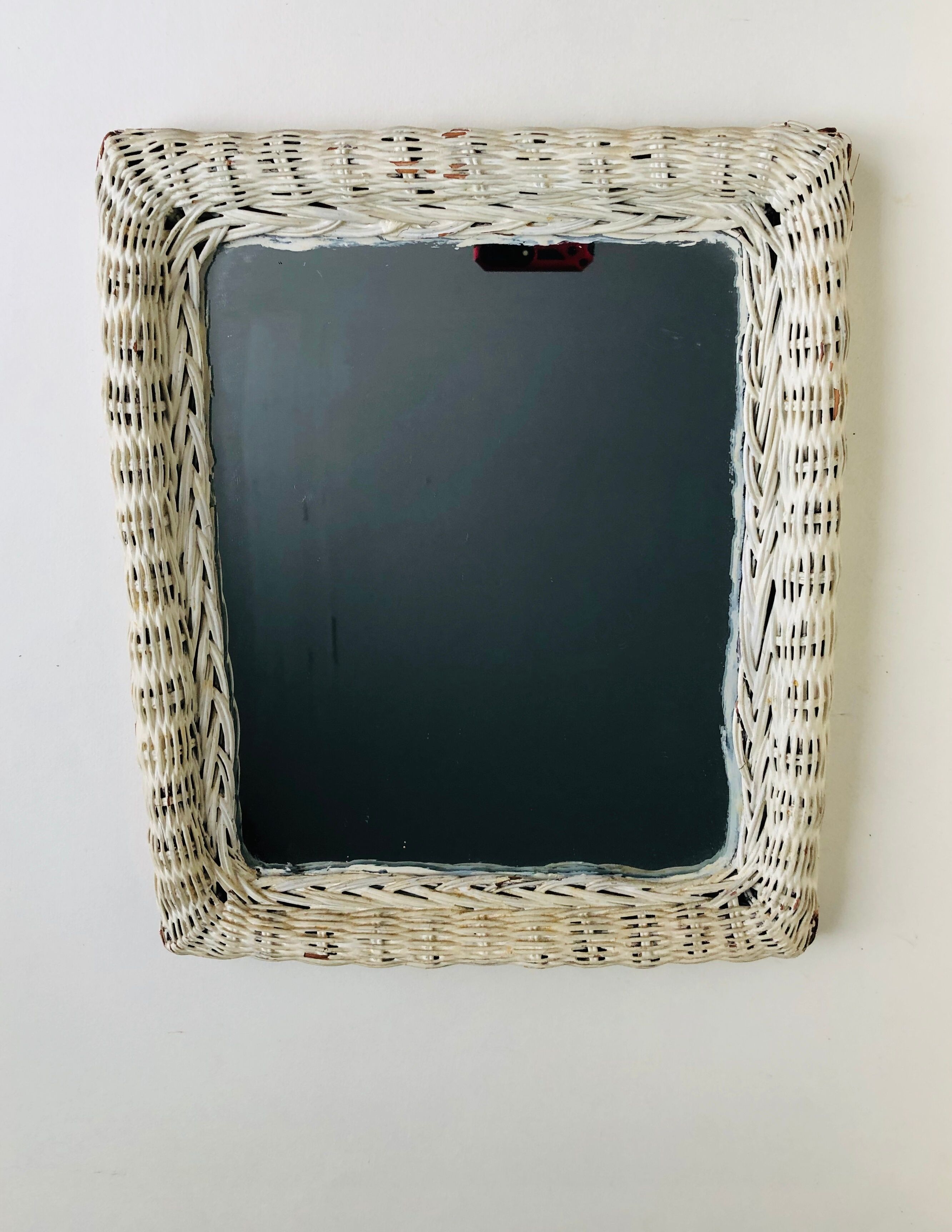 Braided wicker mirror