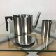Arne Jacobsen stainless steel teapot and milk pot, Cylinda Line, by Stelton