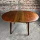 Scandinavian round teak table with integrated extension 70'S