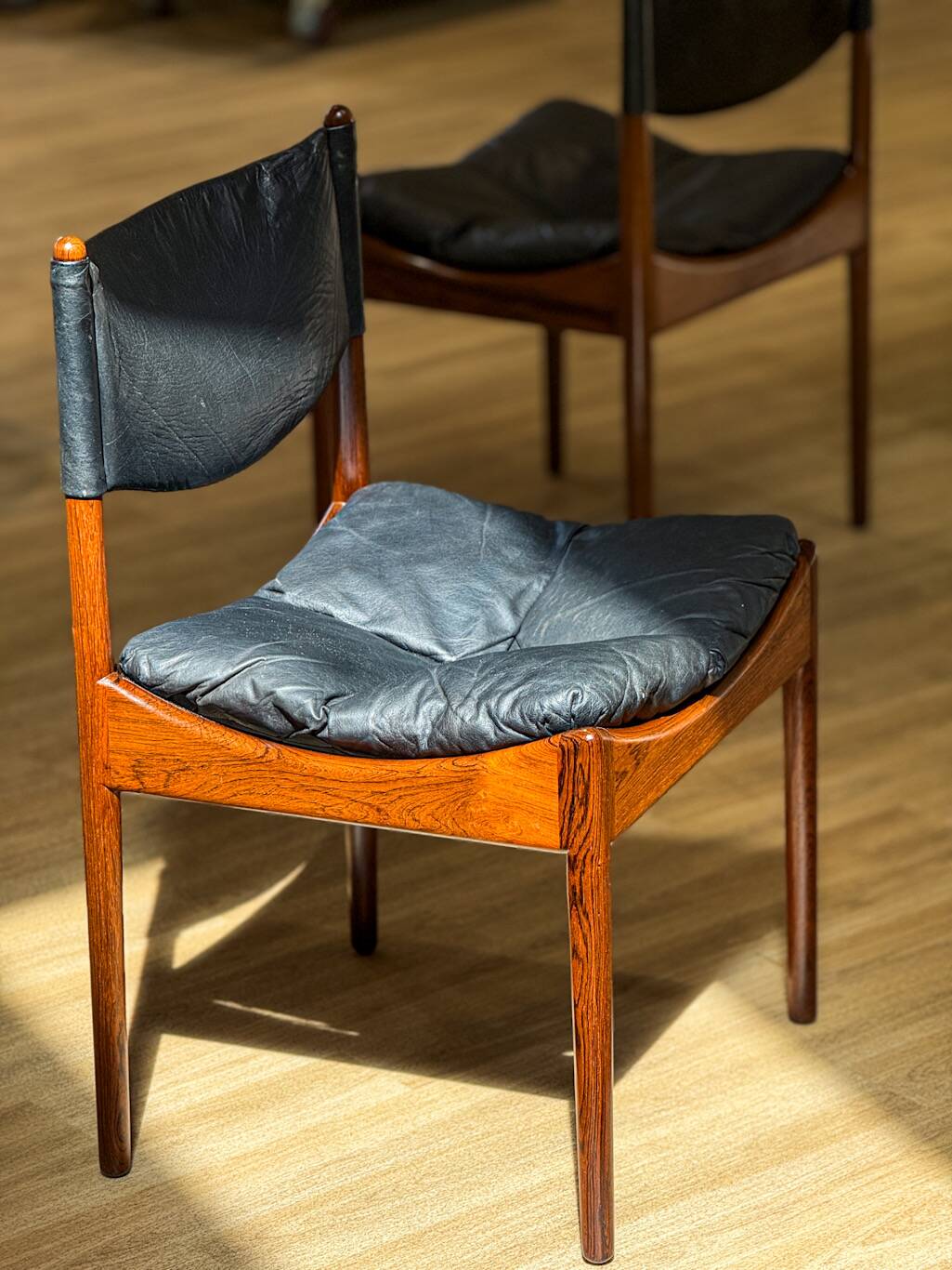 Extendable dining room table and chairs (by Kristian Solmer Vedel)