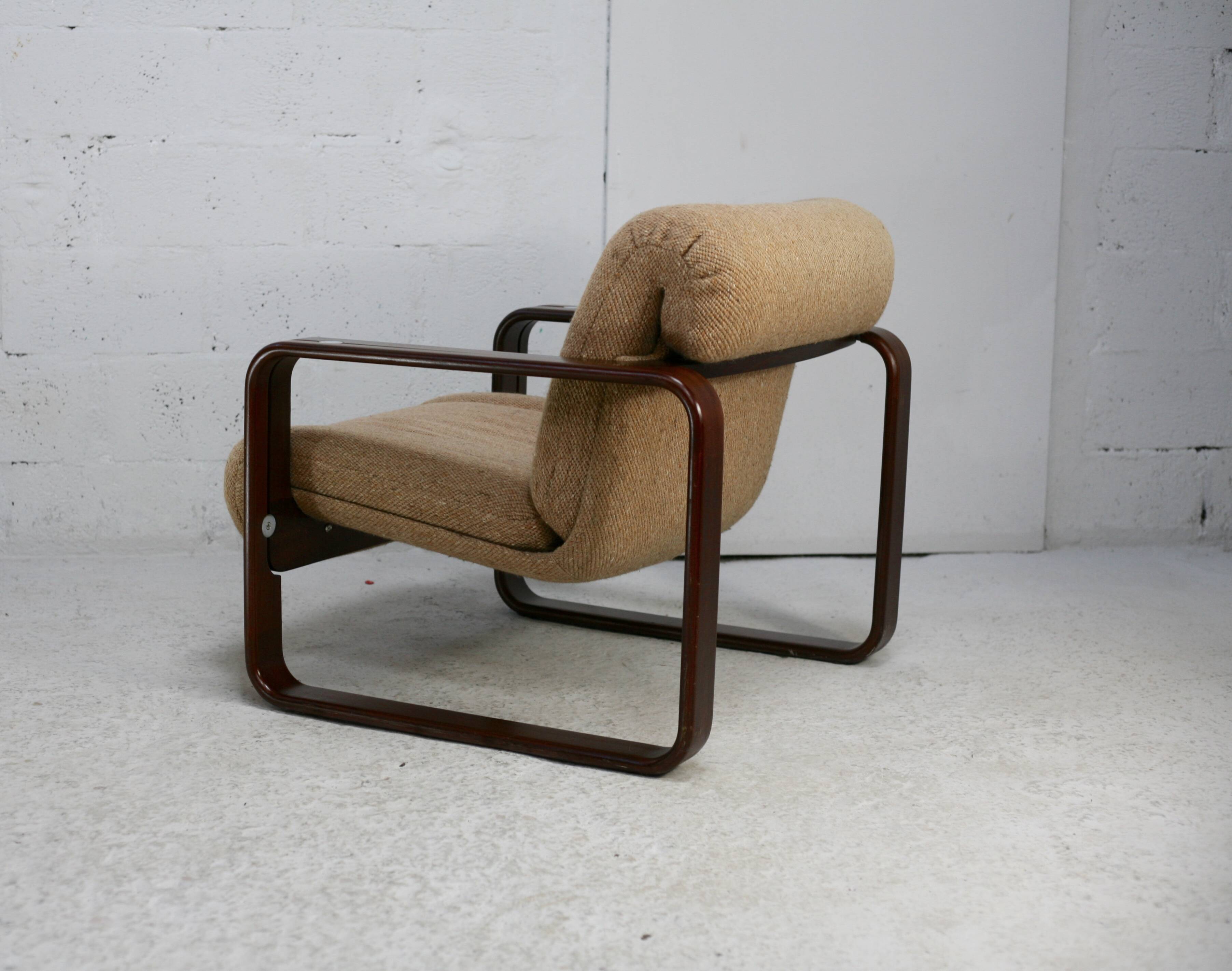 Modernist armchair. Wool, wood and steel. Circa 1970