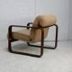 Modernist armchair. Wool, wood and steel. Circa 1970