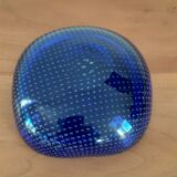 Empty blue bubbled glass pocket