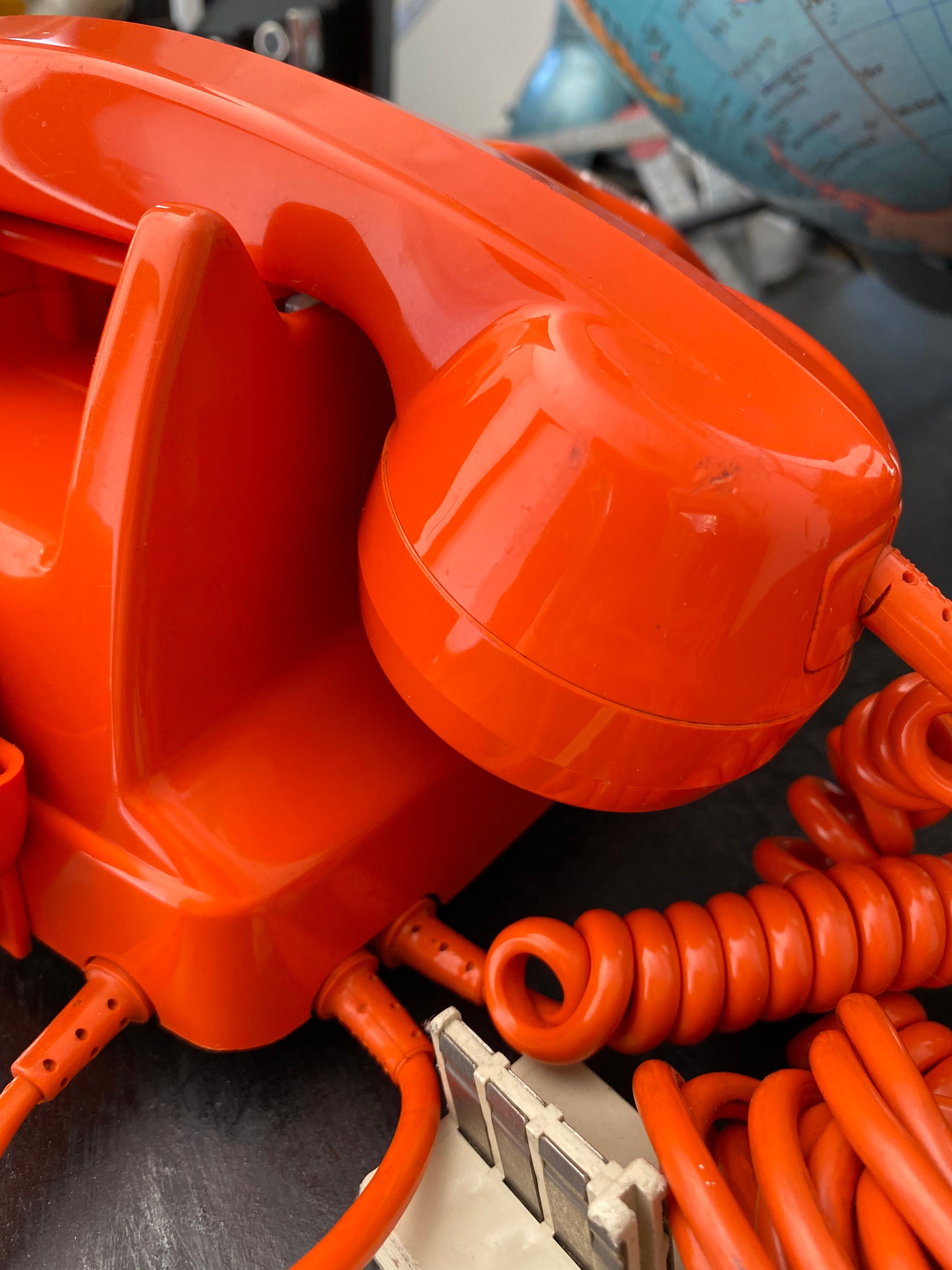 Orange vintage dial phone