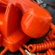 Orange vintage dial phone