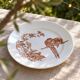 Large round dish from around 1870 signed Longwy with birds in sepia ironstone.