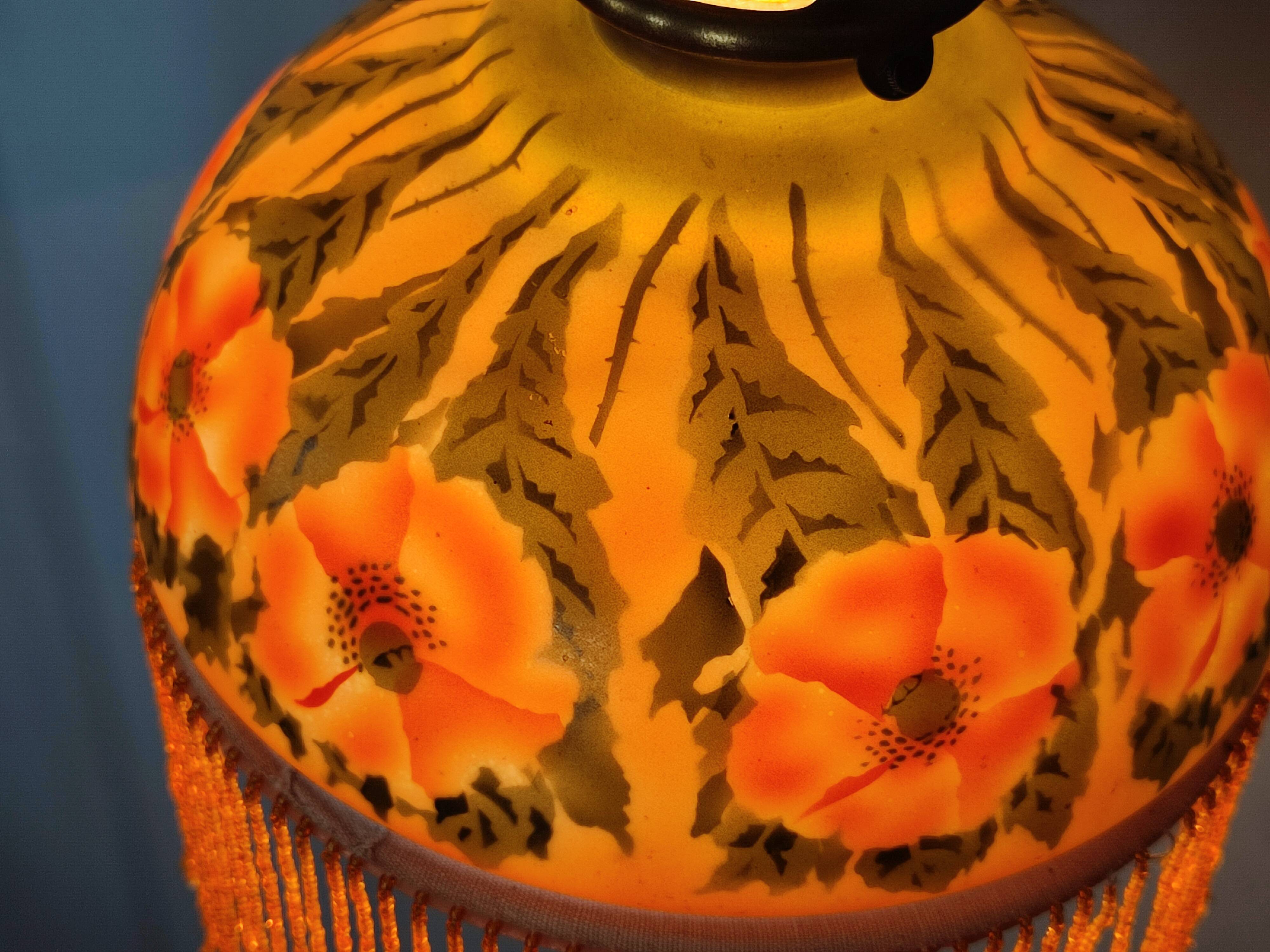 Old opaline and its tassels hanging lamp