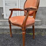Fauteuil médaillon tapissé orange