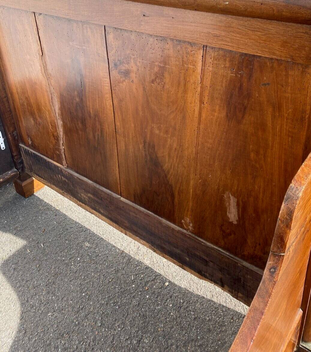 Empire period sleigh bed in solid walnut 19th century
