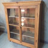 Suspended in early twentieth century tree window