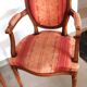 Pair of Louis XVI style cabriolet armchairs with medallion