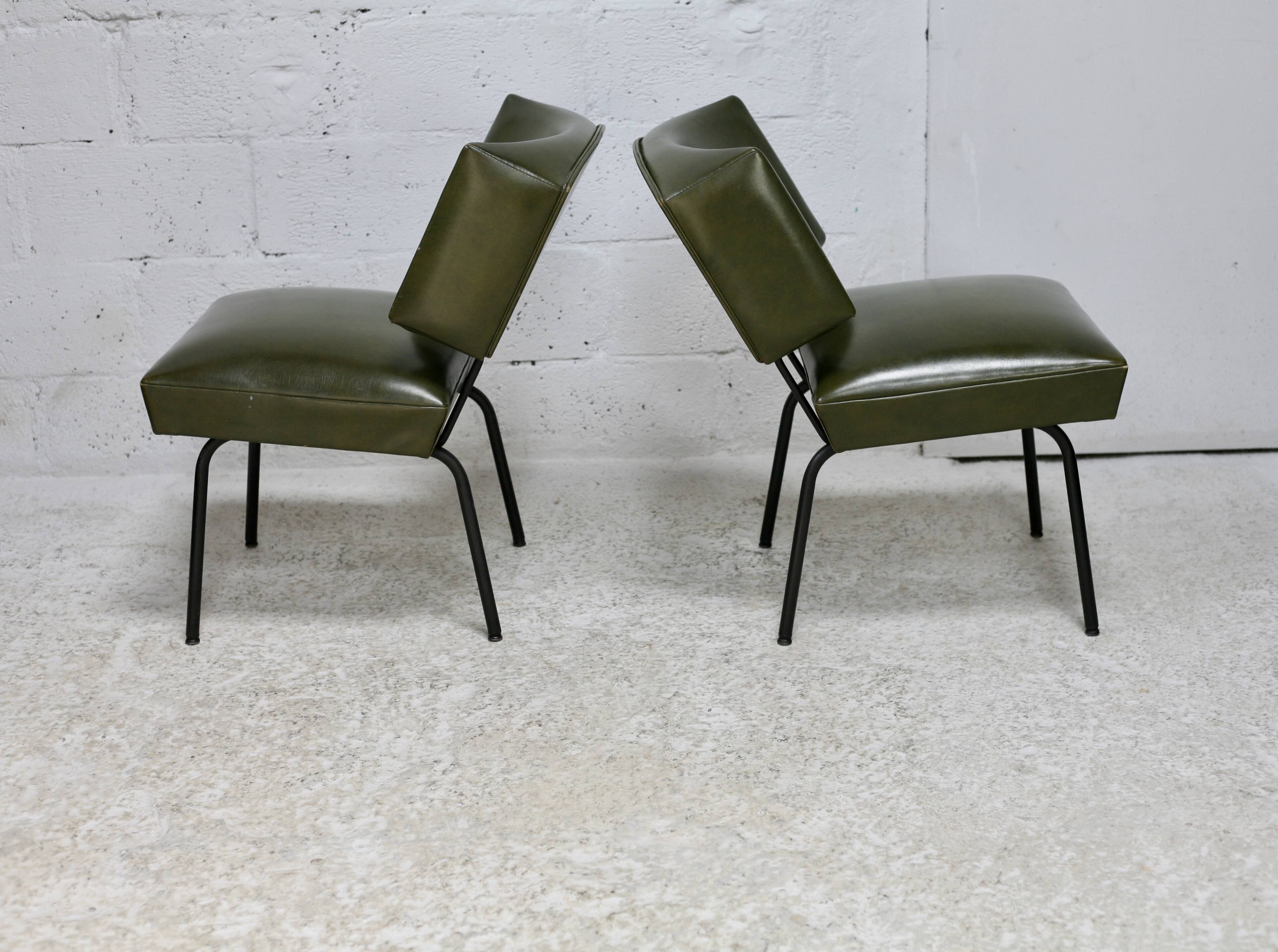 Pair of tubular armchairs, imitation leather. Circa 1950