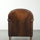 Characterful sheepskin design armchair with beautiful patina