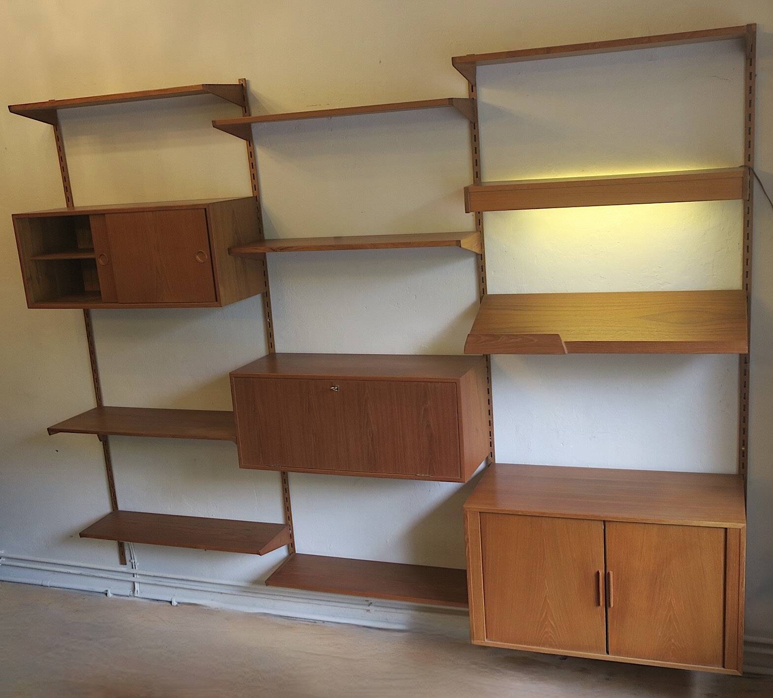Modular 3-compartment teak wall shelving system with desk and lighting by Kai Kristiansen for FM, Denmark, 1960s