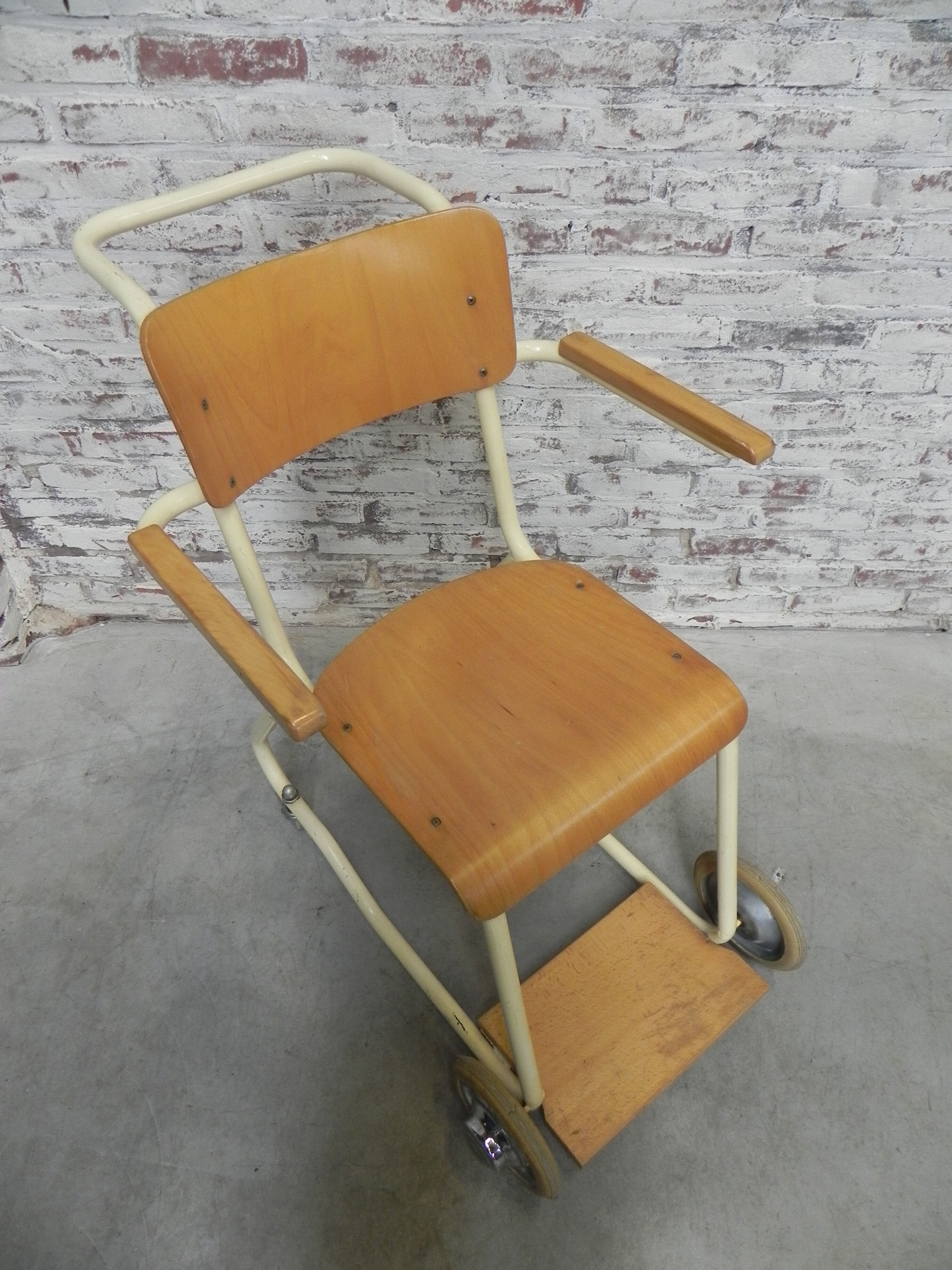 Vintage chair on wheels, wheelchair