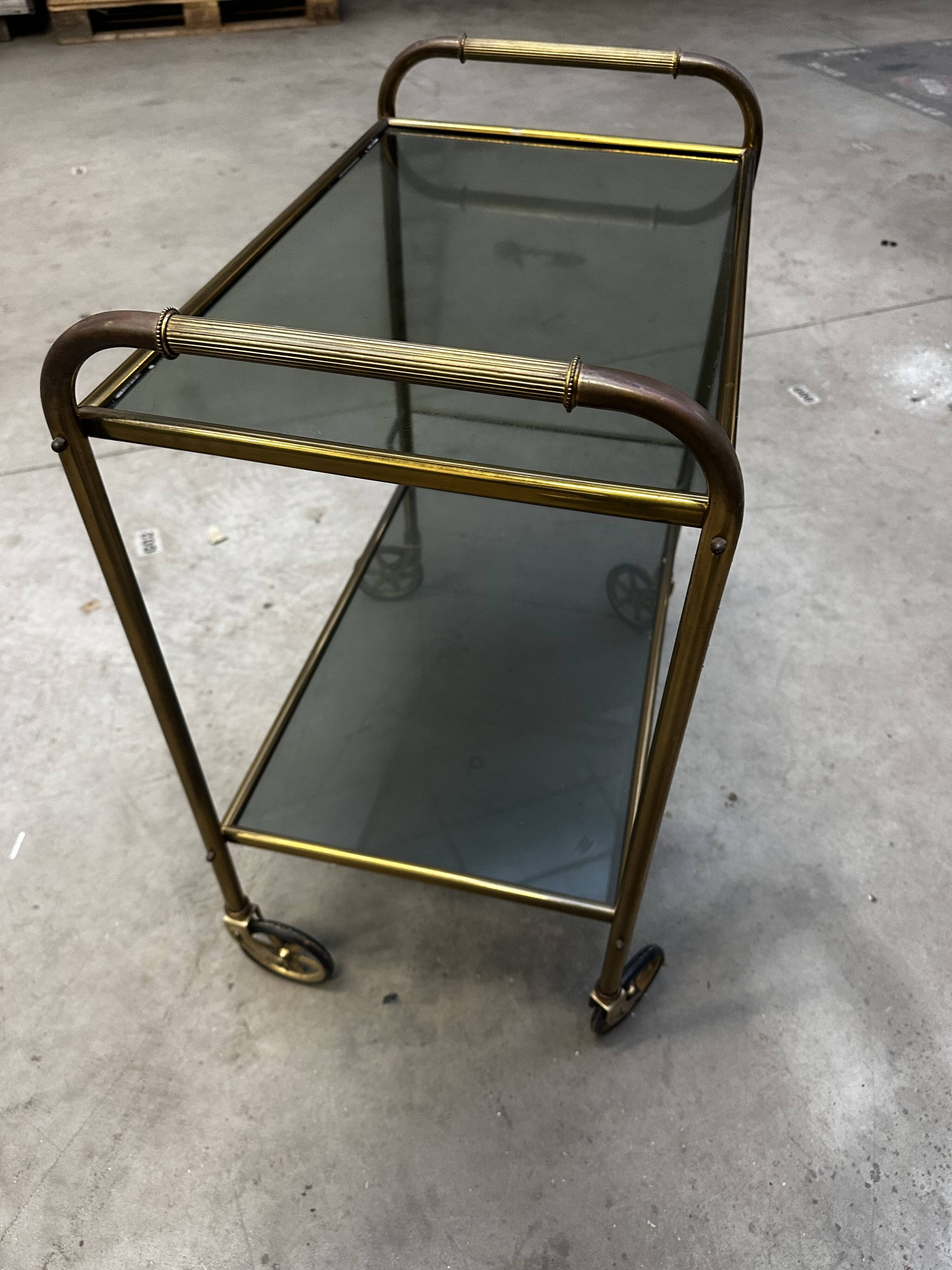 Vintage 70s serving trolley in gold metal and smoked glass