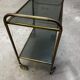 Vintage 70s serving trolley in gold metal and smoked glass