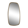 Asymmetrical mirror mirror of the 60/70s
