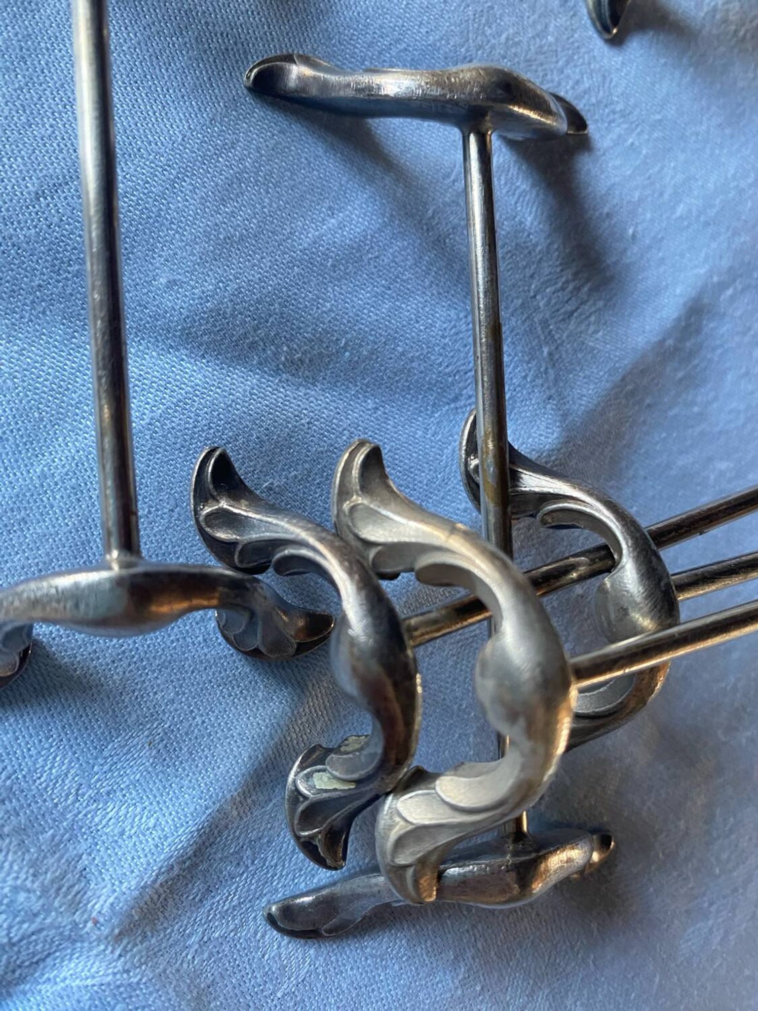 6 porte-couteaux anciens en métal argenté