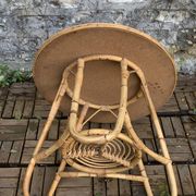 Pair of tripod coffee tables in rattan from the 1950s.