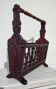 Rustic stained wooden magazine rack