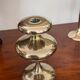Three vintage brass candle holders
