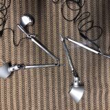 Pair of Tolomeo Tavolo lamps with their wall mount