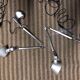 Pair of Tolomeo Tavolo lamps with their wall mount