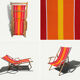 Vintage deck chair with red and orange striped fabric, original patina.
