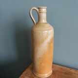 Bottle with handle, pitcher, in stoneware, signed