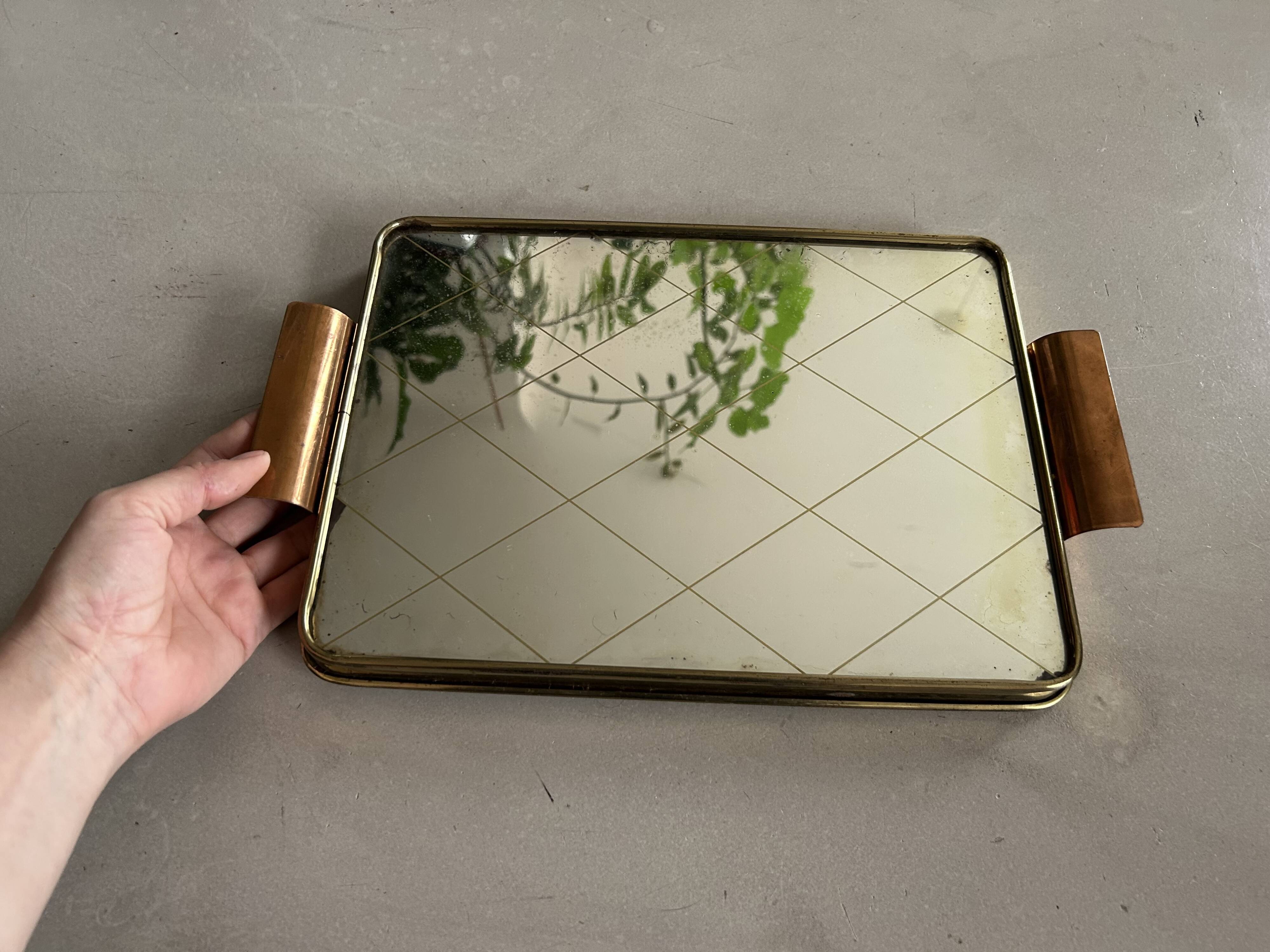 Metal tray and antique mirror