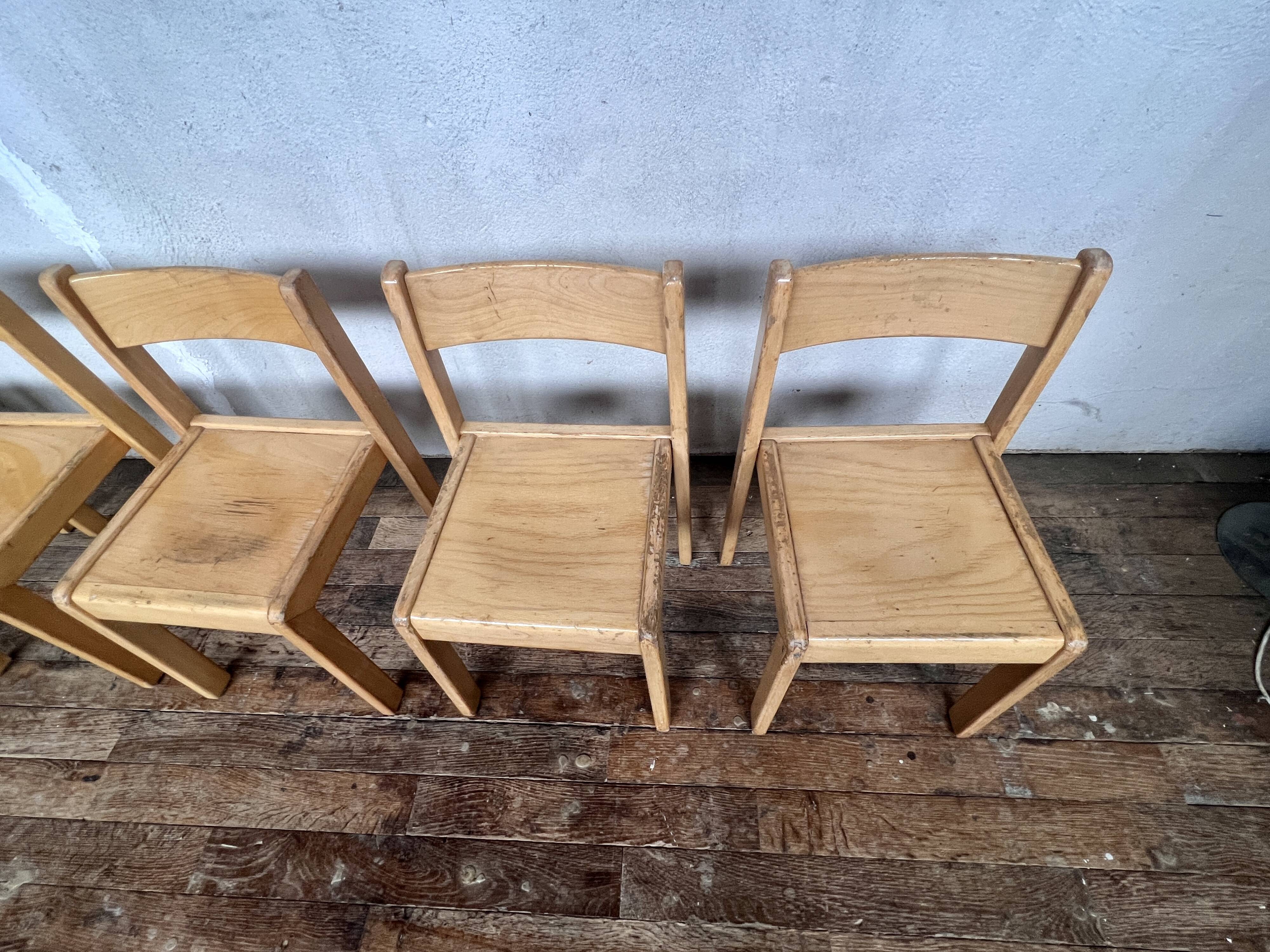 Series of 7 vintage Scandinavian bohemian wooden children's chairs