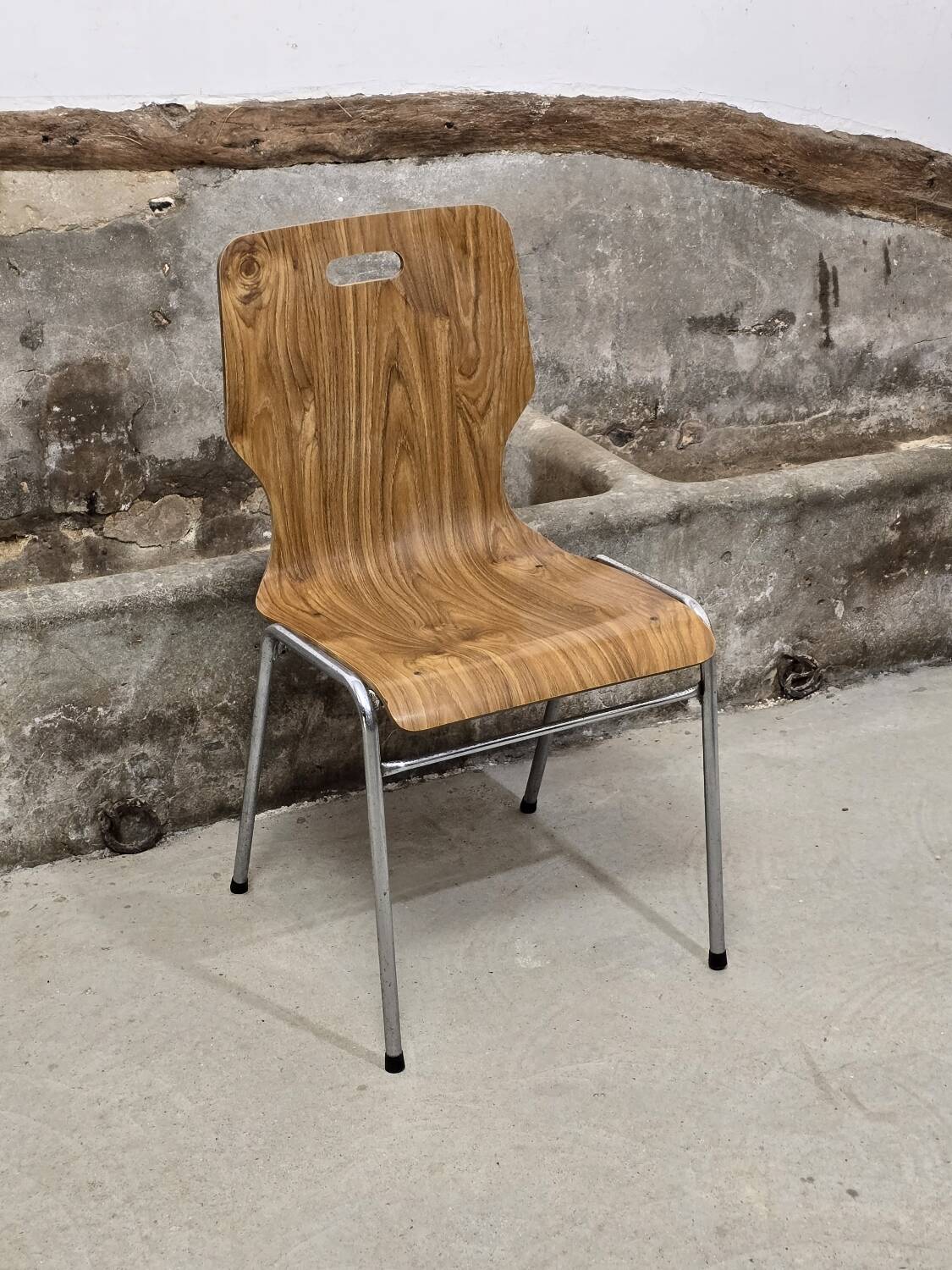 1960s chair in curved plywood on stainless steel base