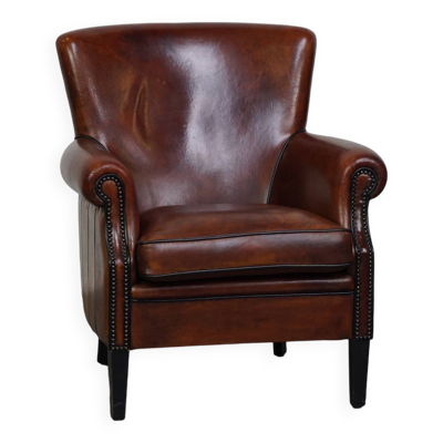 Fauteuil en peau de mouton avec une belle finition et une couleur profonde