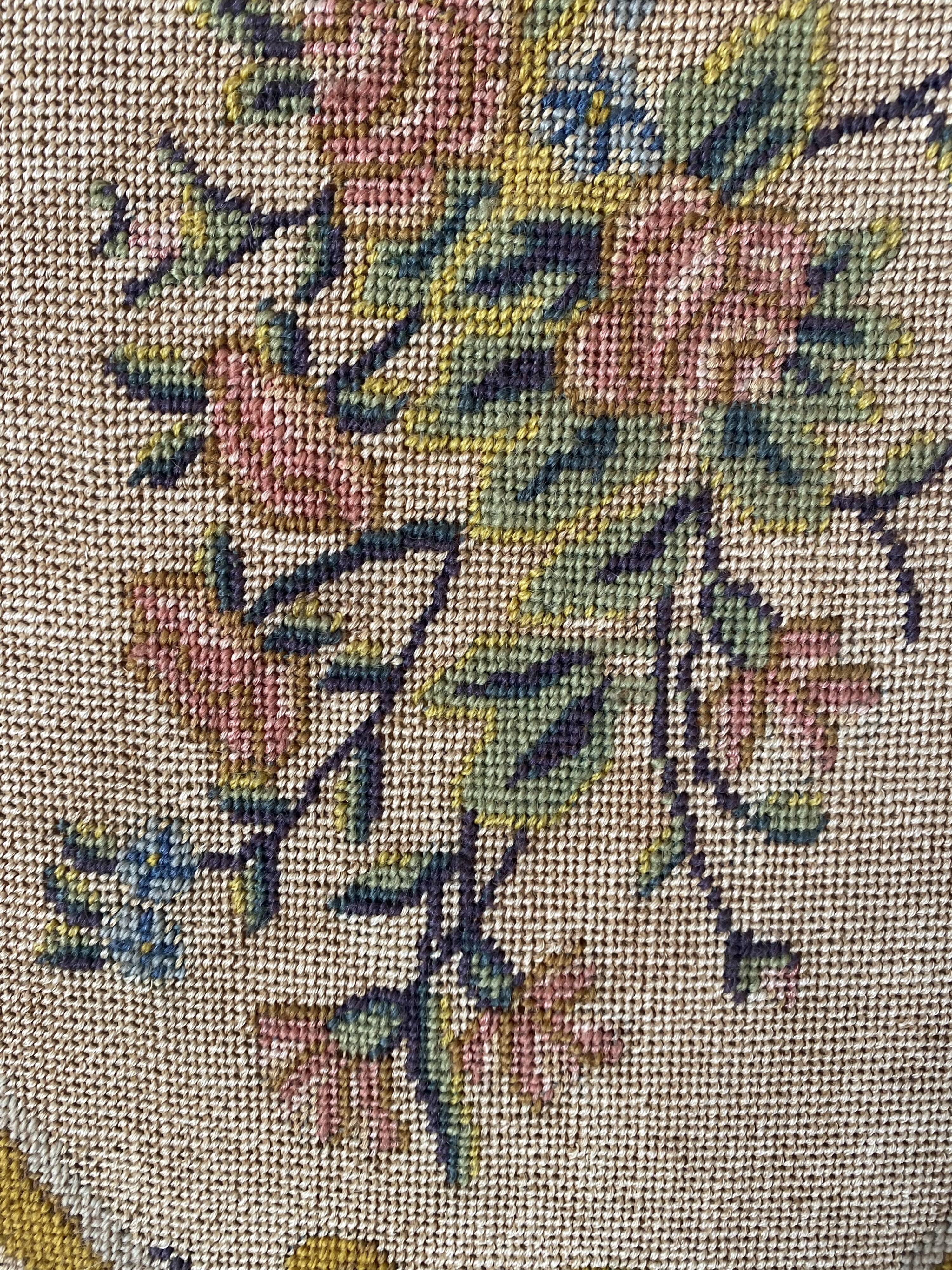 Wooden and embroidered fabric fireplace screen