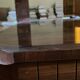 Varnished coffee table in exotic wood