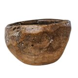 A substantial hand-hewn wooden bowl carved from a single burl section