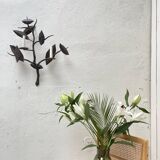 Wall lamp in wrought iron.