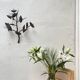 Wall lamp in wrought iron.