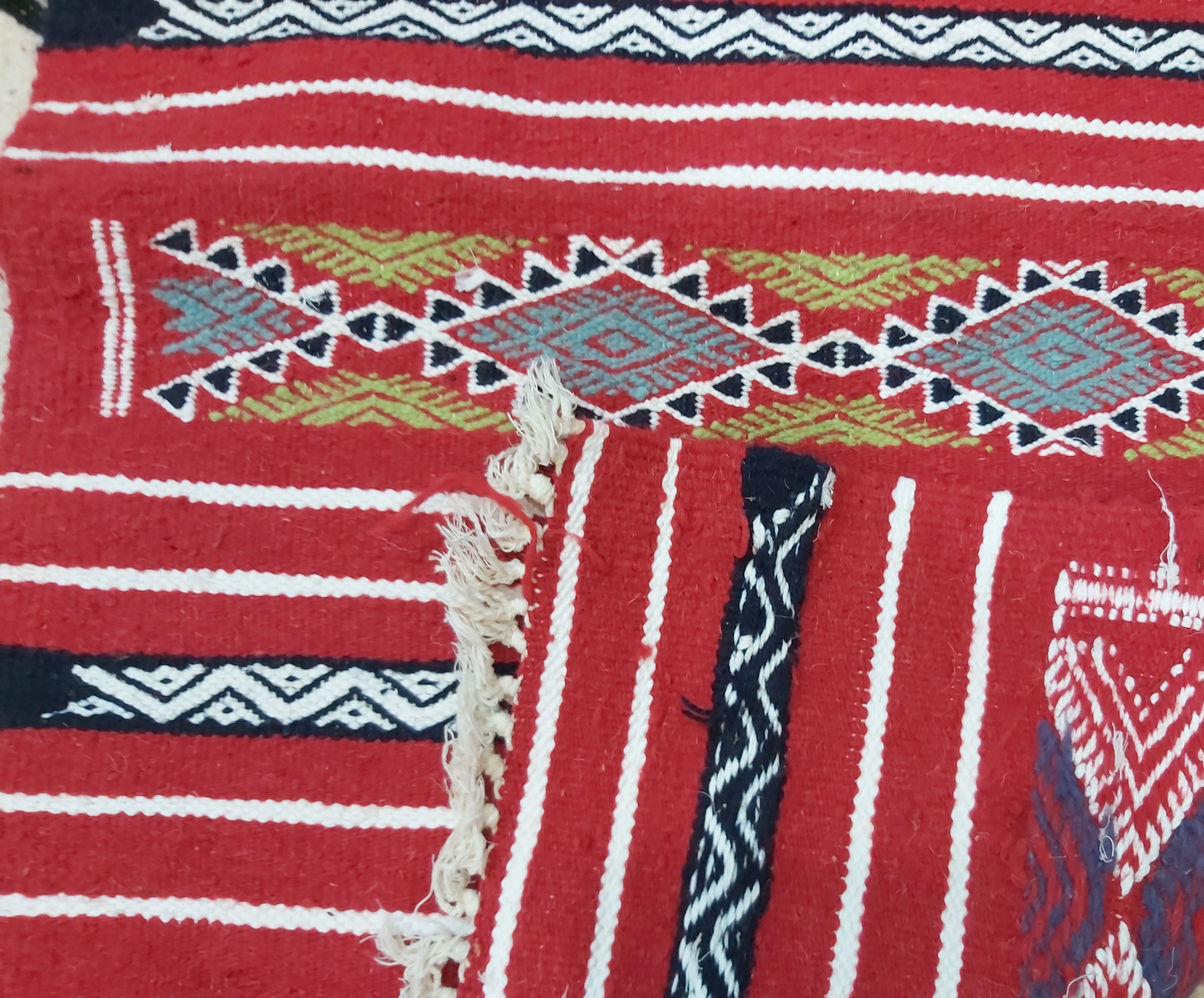 Traditional red kilim carpet