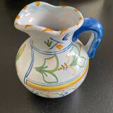 White and blue earthenware milk pitcher